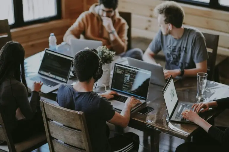 A distributed product engineering team collaborating inside a Global Capability Center office in India